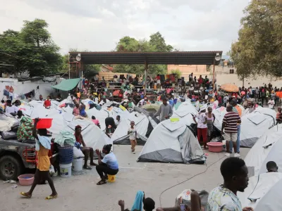 FILE PHOTO: People fleeing gang violence take shelter at a sports arena, in Port-au-Prince, Haiti September 1, 2023. REUTERS/Ralph Tedy Erol/File Photo