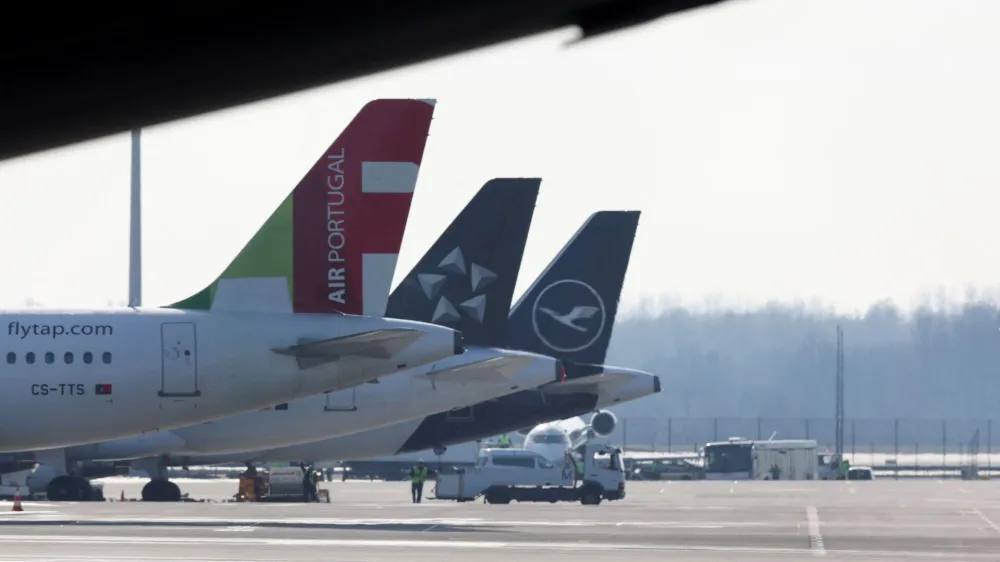 Airplanes are seen on the tarmac the day before VERDI union called airport workers at Frankfurt, Munich, Stuttgart, Hamburg, Dortmund, Hanover and Bremen airports to go on a 24-hour strike on Friday, at the Munich International Airport, Germany, February 16, 2023. REUTERS/Leonhard Simon