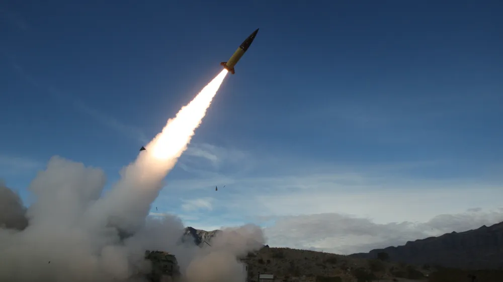 In this image provided by the U.S. Army, soldiers, from the 3rd Battalion, 321st Field Artillery Regiment of the 18th Field Artillery Brigade out of Fort Bragg N.C., conduct live fire testing at White Sands Missile Range, N.M., on Dec. 14, 2021, of early versions of the Army Tactical Missile System. Ukrainian leaders are begging the U.S. and Western allies for air defense systems and longer-range weapons to keep up the momentum in their counteroffensive against Russia and fight back against Moscow's intensified attacks. Defense Secretary Lloyd Austin says allies are committed to sending weapons "as fast as we can physically get them there." (John Hamilton/U.S. Army via AP)