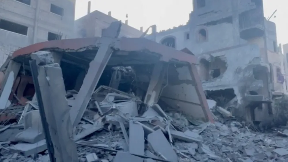 Rubble and a damaged building are seen in the aftermath of an Israeli strike in Jabalia, in the northern Gaza Strip, October 12, 2023 in this still image obtained from social media video. Ibrahim Nofal via REUTERS MANDATORY CREDIT. NO RESALES. NO ARCHIVES. THIS IMAGE HAS BEEN SUPPLIED BY A THIRD PARTY.