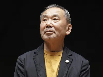 FILE - Japanese novelist Haruki Murakami poses for media members during a news conference on the university's new international house of literature also known as The Haruki Murakami Library at the Waseda University in Tokyo on Sept. 22, 2021. Japanese best-selling cult novelist Murakami has won the 2023 Princess of Asturias Award for literature, the Spanish foundation that organizes the prizes said Wednesday, May 24, 2023. (AP Photo/Eugene Hoshiko, File)