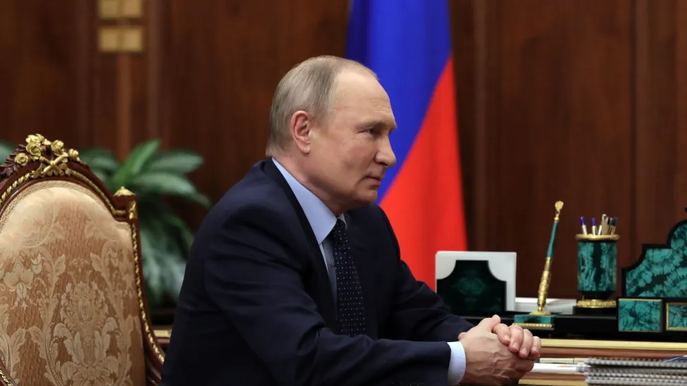 Russian President Vladimir Putin listens during a meeting in the Kremlin in Moscow, Russia, Friday, May 6, 2022. (Mikhail Klimentyev, Sputnik, Kremlin Pool Photo via AP)