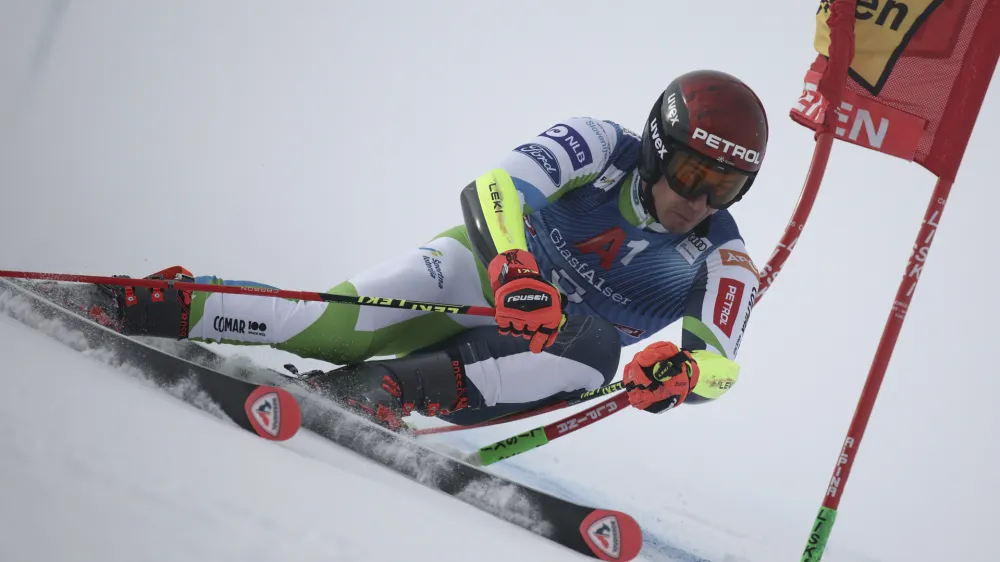 Slovenia's Zan Kranjec speeds down the course during the first run of an alpine ski, men's World Cup giant slalom race, in Soelden, Austria, Sunday, Oct. 29, 2023. (AP Photo/Gabriele Facciotti)