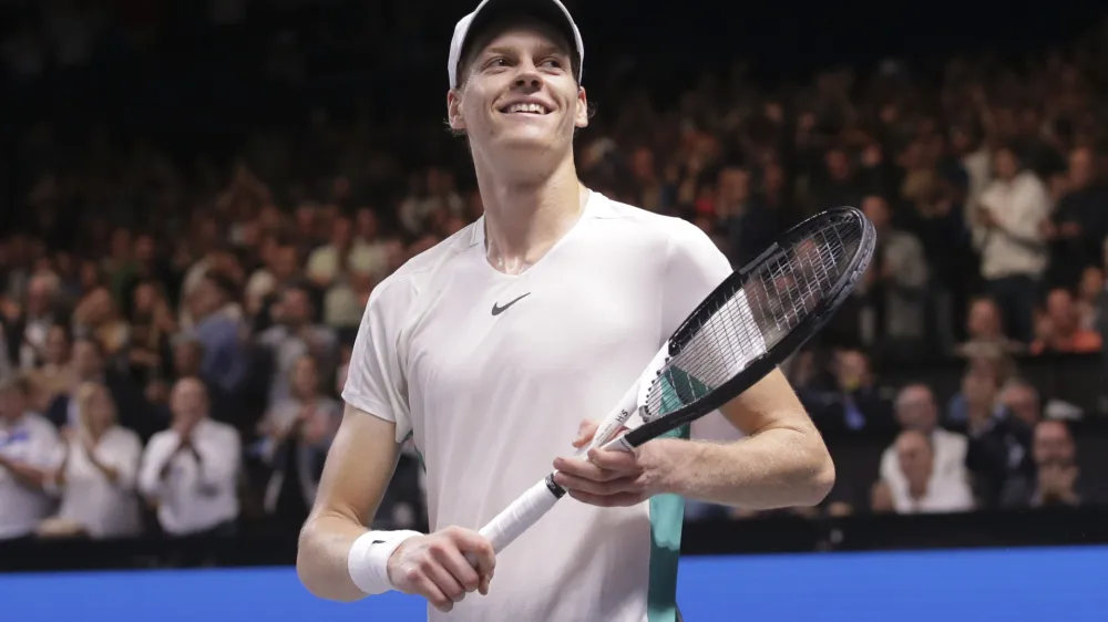 Jannik Sinner of Italy celebrates after defeating Daniil Medvedev of Russia during the final match at the Erste Bank Open ATP tennis tournament in Vienna, Austria, Sunday, Oct. 29, 2023. Sinner won 7-6 (7), 4-6, 6-3. (AP Photo/Heinz-Peter Bader)