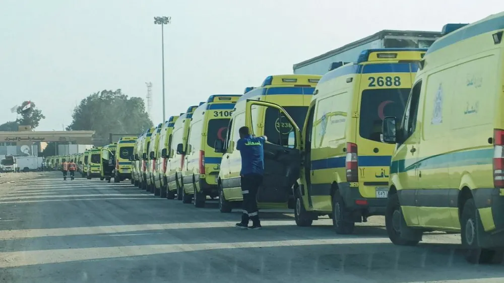 Egyptian ambulances convoy which will carry critically injured people waits to go through the Rafah crossing from the Egyptian side, amid the ongoing conflict between Israel and the Palestinian Islamist group Hamas, in Rafah, Egypt November 1, 2023. REUTERS/Stringer