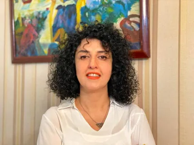 FILE PHOTO: Iranian human rights activist and the vice president of the Defenders of Human Rights Center (DHRC) Narges Mohammadi poses in this undated handout picture. Mohammadi family archive photos/Handout via REUTERS/File Photo