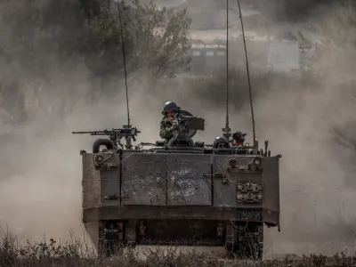 31 October 2023, Israel, Sderot: An Israeli armoured personnel carrier drives on the Gaza-Israel border amid ongoing conflict between Israel and the Palestinian group Hamas. According to eyewitness reports, Israeli tanks have been deployed on the central streets of Gaza City. Photo: Ilia Yefimovich/dpa