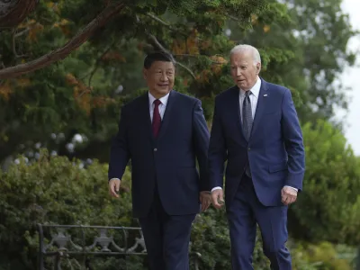 President Joe Biden and China's President President Xi Jinping walk in the gardens at the Filoli Estate in Woodside, Calif., Wednesday, Nov, 15, 2023, on the sidelines of the Asia-Pacific Economic Cooperative conference. (Doug Mills/The New York Times via AP, Pool)