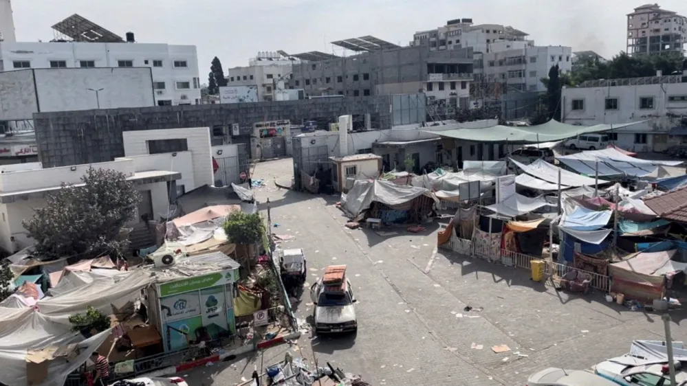 FILE PHOTO: Tents and shelters used by displaced Palestinians stand at the yard of Al Shifa hospital during the Israeli ground operation around the hospital, in Gaza City November 12, 2023. Ahmed El Mokhallalati/via REUTERS/File Photo