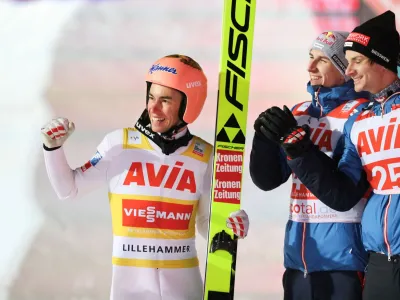 Ski Jumping - FIS Ski Jumping World Cup - Lillehammer, Norway - December 2, 2023 Austria's Stefan Kraft celebrates winning the men's normal hill HS98 with Jan Hoerl Geir Olsen/NTB via REUTERS ATTENTION EDITORS - THIS IMAGE WAS PROVIDED BY A THIRD PARTY. NORWAY OUT. NO COMMERCIAL OR EDITORIAL SALES IN NORWAY.