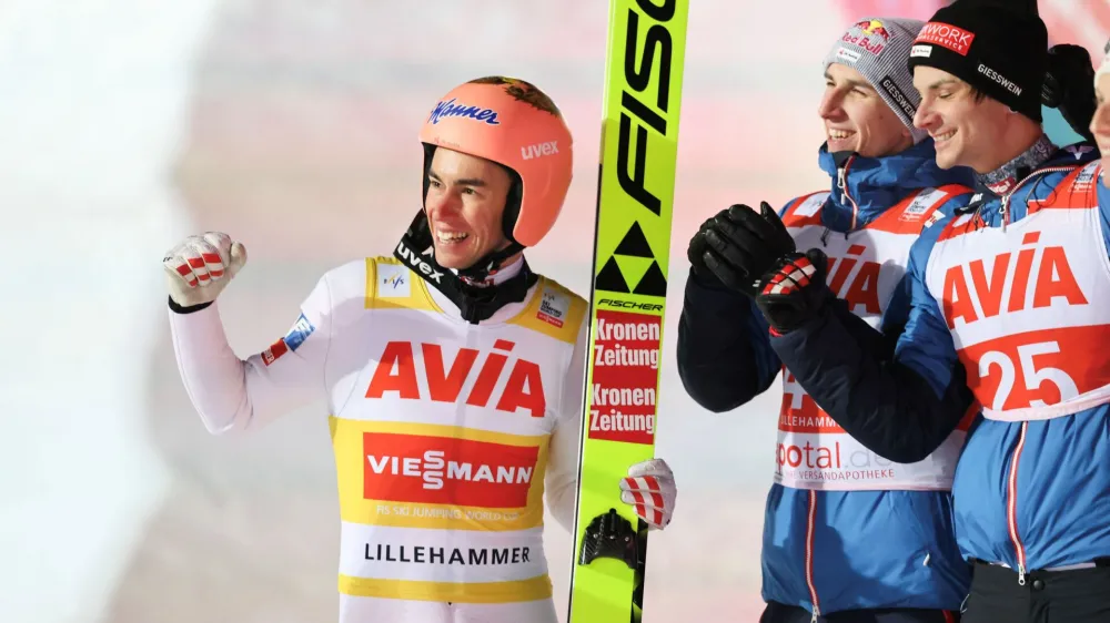 Ski Jumping - FIS Ski Jumping World Cup - Lillehammer, Norway - December 2, 2023 Austria's Stefan Kraft celebrates winning the men's normal hill HS98 with Jan Hoerl Geir Olsen/NTB via REUTERS ATTENTION EDITORS - THIS IMAGE WAS PROVIDED BY A THIRD PARTY. NORWAY OUT. NO COMMERCIAL OR EDITORIAL SALES IN NORWAY.