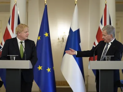 British Prime Minister Boris Johnson, left, and Finland's President Sauli Niinisto meet the media at the Presidential Palace in Helsinki, Finland, Wednesday, May 11, 2022. Britain has signed a security assurance with Sweden and its neighbor Finland, both pondering whether to join NATO following Russia's invasion of Ukraine, pledging to "bolster military ties" in the event of a crisis and support both countries should they come under attack. (AP Photo/Frank Augstein, Pool)