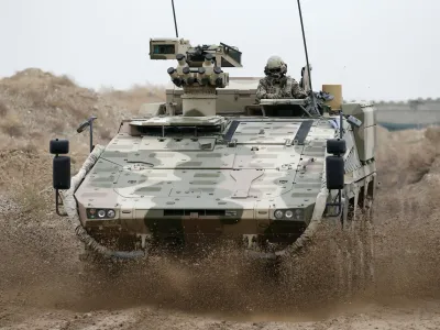 A German Bundeswehr army Boxer armoured personnel carrier drives at camp Marmal near Mazar-e-Sharif, northern Afghanistan December 17, 2012.   REUTERS/Fabrizio Bensch (AFGHANISTAN - Tags: MILITARY CONFLICT POLITICS) - GM1E8CH1D2I01