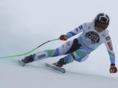 Slovenia's Ilka Stuhec speeds down the course during an alpine ski, women's World Cup downhill race in Crans Montana, Switzerland, Sunday, Feb. 26, 2023. (AP Photo/Alessandro Trovati)