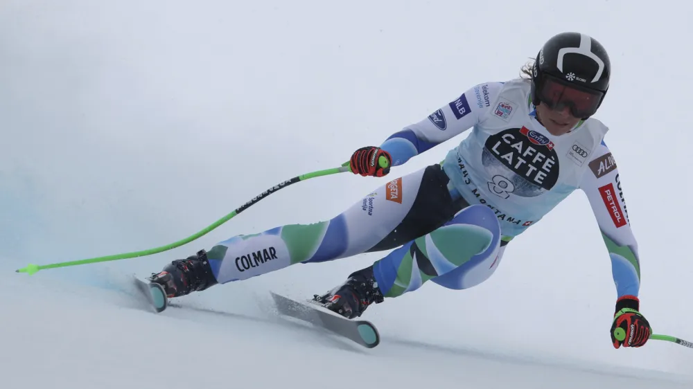 Slovenia's Ilka Stuhec speeds down the course during an alpine ski, women's World Cup downhill race in Crans Montana, Switzerland, Sunday, Feb. 26, 2023. (AP Photo/Alessandro Trovati)