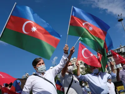 ﻿Demonstrators wave flags of Azerbaijan and Turkey during a protest against Armenia in Istanbul, Turkey October 1, 2020. REUTERS/Murad Sezer