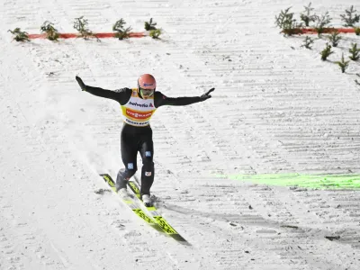 ﻿Karl Geiger of Germany in action, during the men's ski jumping FIS World Cup at the Titlisschanze, in Engelberg, Switzerland, Sunday, Dec. 19, 2021. (Gian Ehrenzeller/Keystone via AP)