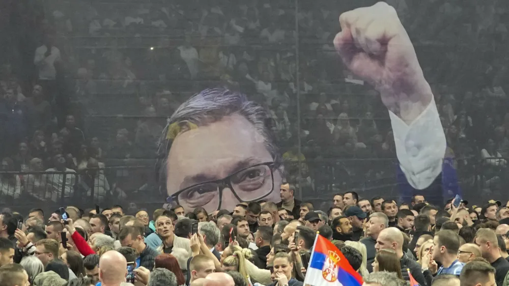 An image of Serbian President Aleksandar Vucic is seen during a pre-election rally of his ruling Serbian Progressive Party in Belgrade, Serbia, Saturday, Dec. 2, 2023. When Serbia formally opened membership negotiations with the European Union, back in 2014, it was a moment of hope for pro-Western Serbs, eager to set their troubled country on an irreversible path to democratization. Those days are long gone. Now, they feel betrayed, both by the government and the EU. (AP Photo/Darko Vojinovic)