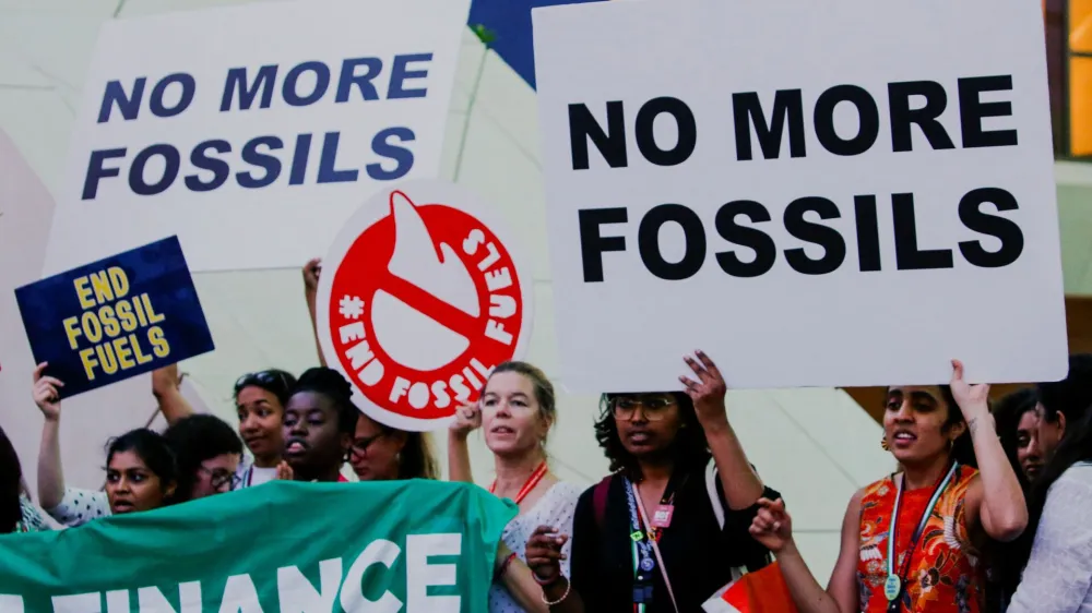 Climate activists protest against fossil fuels at Dubai's Expo City during the United Nations Climate Change Conference COP28 in Dubai, United Arab Emirates, December 12, 2023. REUTERS/Thomas Mukoya