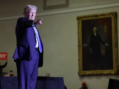 FILE PHOTO: Republican presidential candidate and former U.S. President Donald Trump gestures during a campaign rally in Claremont, New Hampshire, U.S., November 11, 2023. REUTERS/Brian Snyder/File Photo