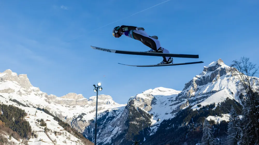 Anze Lanisek of Slovenia soars through the air during the men's FIS Ski Jumping World Cup competition at the Gross-Titlis Schanze on Sunday, Dec. 18, 2022 in Engelberg, Switzerland. (KEYSTONE/Philipp Schmidli)