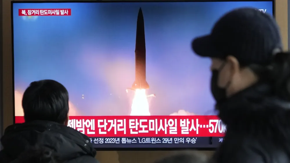 A TV screen shows a file image of North Korea's missile launch during a news program at the Seoul Railway Station in Seoul, South Korea, Monday, Dec. 18, 2023. North Korea fired an intercontinental ballistic missile into the sea Monday in a resumption of its high-profile weapons testing activities, its neighbors said, as the North vows strong responses against U.S. and South Korean moves to boost their nuclear deterrence plans. (AP Photo/Ahn Young-joon)