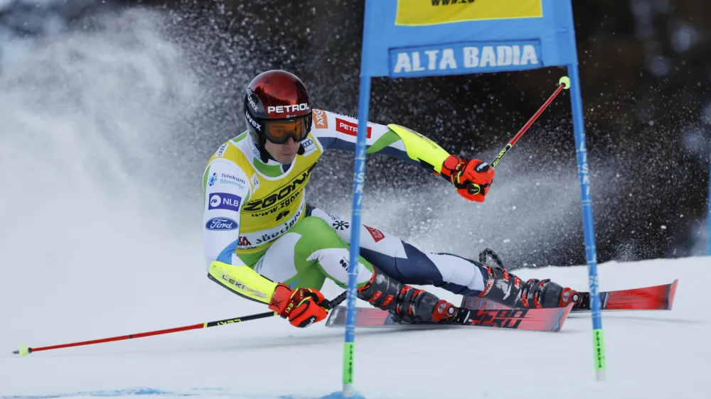 Slovenia's Zan Kranjec speeds down the course during the first run of an alpine ski, men's World Cup giant slalom race, in Alta Badia, Italy, Monday, Dec. 18, 2023. (AP Photo/Alessandro Trovati)