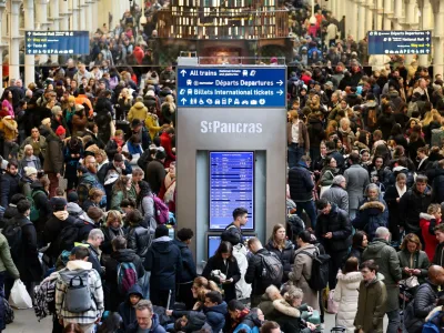 Passengers gather at the departure gates of the Eurostar terminal at St Pancras International Station after the services are cancelled due to a flooded tunnel, in London, Britain, December 30, 2023. REUTERS/Belinda Jiao