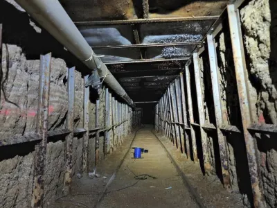 This undated photo provided by Homeland Security Investigations shows the inside of a cross border tunnel between Mexico's Tijuana into the San Diego area. Authorities announced on Monday, May 16, 2022, the discovery of the underground smuggling tunnel on Mexico's border, running the length of a football field on U.S. soil to a warehouse in an industrial area. The cross-border tunnel from Tijuana to the San Diego area was built in one of the most fortified stretches of the border, illustrating the limitations of former President Donald Trump's border wall. (Homeland Security Investigations via AP)