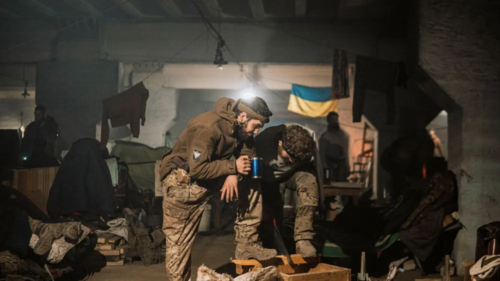 Service members of the Ukrainian armed forces are seen within the Azovstal Iron and Steel Works complex in Mariupol, Ukraine May 20, 2022. Dmytro Orest Kozatskyi/Azov regiment press service /Handout via REUTERS  THIS IMAGE HAS BEEN SUPPLIED BY A THIRD PARTY. MANDATORY CREDIT REUTERS COULD NOT INDEPENDENTLY VERIFY THE AUTHENTICITY OF THE PHOTO.