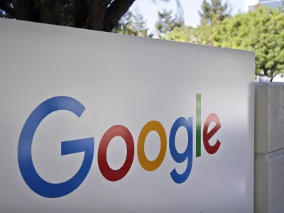 This Oct. 20, 2015 photo shows the Google logo outside the company's headquarters in Mountain View, Calif. Alphabet Inc., parent company of Google, reports quarterly financial results Thursday, Oct. 22, 2015. (AP Photo/Marcio Jose Sanchez, FIle)