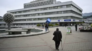 People walk outside the F. D. Roosevelt University Hospital, where Slovak Prime Minister Robert Fico, who was shot and injured, is treated, in Banska Bystrica, central Slovakia, Friday, May 17, 2024. Fico, 59, was shot multiple times on Wednesday as he was greeting supporters after a government meeting in the former coal mining town of Handlova. Officials at first reported that doctors were fighting for his life but after a five-hour operation described his situation as serious but stable. (AP Photo/Denes Erdos)