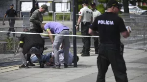 Police arrest a man after Slovak Prime Minister Robert Fico was shot and injured following the cabinet's away-from-home session in the town of Handlova, Slovakia, Wednesday, May 15, 2024. Fico is in life-threatening condition after being wounded in a shooting Wednesday afternoon, according to his Facebook profile. (Radovan Stoklasa/TASR via AP)