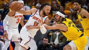 May 17, 2024; Indianapolis, Indiana, USA; New York Knicks guard Jalen Brunson (11) dribbles the ball while Indiana Pacers guard Andrew Nembhard (2) defends during game six of the second round for the 2024 NBA playoffs at Gainbridge Fieldhouse. Mandatory Credit: Trevor Ruszkowski-USA TODAY Sports