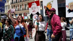 People protest the visit of Argentinean President Javier Milei as he is expected to attend the meeting of Spanish far-right party Vox, among others like Vox party leader Santiago Abascal, Marine Le Pen, president of the French far-right National Rally (Rassemblement National - RN), and Hungarian Prime Minister Viktor Orban, in Madrid, Spain, May 18, 2024. REUTERS/Ana Beltran