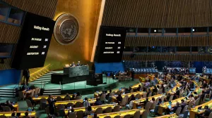 Screens show results of the United Nations General Assembly's vote on the creation of an international day to commemorate the Srebrenica genocide, at the United Nations Headquarters in New York City, U.S. May 23, 2024. REUTERS/Eduardo Munoz