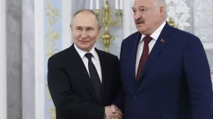 Russian President Vladimir Putin, left, and Belarusian President Alexander Lukashenko attend a meeting at the Palace of Independence in Minsk, Belarus, Friday, May 24, 2024. (Mikhail Metzel, Sputnik, Kremlin Pool Photo via AP)