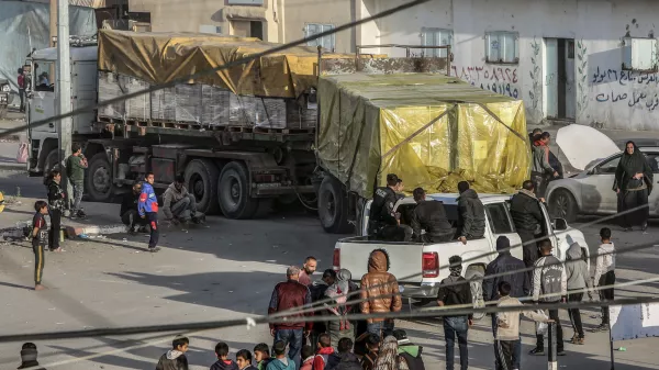 17 January 2024, Palestinian Territories, Rafah: Trucks carrying humanitarian aid enter the Gaza Strip through the the Kerem Shalom crossing border. Photo: Abed Rahim Khatib/dpa