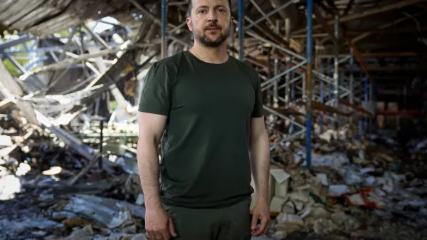 Ukrainian President Volodymyr Zelenskiy stands inside a printworks compound, destroyed on Thursday in a Russian airstrike, during his appeal to U.S. President Joe Biden and Chinese President Xi Jinping to join an upcoming peace summit, amid Russia's attack on Ukraine, in Kyiv, Ukraine May 26, 2024. Ukrainian Presidential Press Service/Handout via REUTERS ATTENTION EDITORS - THIS IMAGE HAS BEEN SUPPLIED BY A THIRD PARTY.