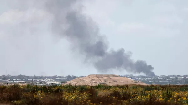 Smoke rises following an airstrike in Gaza, amid the ongoing conflict between Israel and the Palestinian Islamist group Hamas, near the Israel-Gaza border, as seen from Israel, May 25, 2024.REUTERS/Thomas Suen