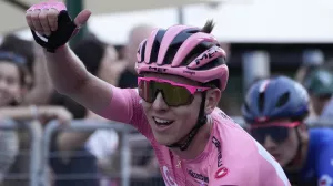 Slovenia's Tadej Pogacar, wearing the pink jersey overall leader, crosses the finish line of the 21st and last stage of the Giro D'Italia, tour of Italy cycling race, in Rome, Sunday, May 26, 2024. (AP Photo/Andrew Medichini)