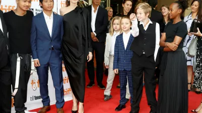 ﻿FILE PHOTO: Director Angelina Jolie arrives on the red carpet with her six children (L-R) Maddox Jolie-Pitt, Pax Jolie-Pitt, Vivienne Jolie-Pitt, Knox Leon Jolie-Pitt, Shiloh Jolie-Pitt, and Zahara Jolie-Pitt for the film "First They Killed My Father" at the Toronto International Film Festival (TIFF), in Toronto, Ontario, Canada, September 11, 2017.  REUTERS/Mark Blinch/File Photo