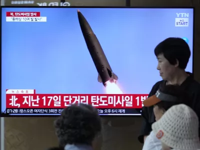 A news program broadcasts a file image of a missile launch by North Korea, at the Seoul Railway Station in Seoul, South Korea, Thursday, May 30, 2024. North Korea on Thursday fired a barrage of ballistic missiles toward its eastern sea, according to South Korea's military, days after its attempt to launch a military reconnaissance satellite ended in failure but still drew strong condemnation from its rivals. (AP Photo/Ahn Young-joon)