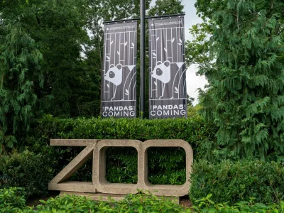 A banner reading "Pandas are Coming" is seen at the entrance of the National Zoo after China's ambassador to the United States Xie Feng spoke to the media as he and staff members from The National Zoo and Conservation Biology Institute (NZCBI) announced that China will send two young giant pandas to the United States, during an update on the future of the giant panda conservation program at Smithsonian's National Zoo in Washington, U.S., May 29, 2024. REUTERS/Ken Cedeno