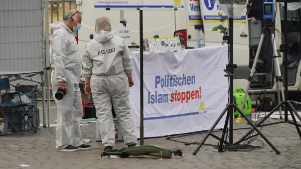 Police investigators work at the scene where a bearded man attacked people at a far right-wing information stand of the Buergerbewegung Pax Europa (BPE) in the central market of the city of Mannheim, Germany, May 31, 2024. REUTERS/Timm Reichert