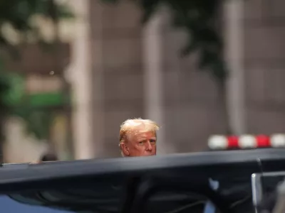 Republican presidential candidate and former U.S. President Donald Trump looks on outside Trump Tower, the day after a guilty verdict in his criminal trial over charges that he falsified business records to conceal money paid to silence porn star Stormy Daniels in 2016, in New York City, U.S., May 31, 2024. REUTERS/Andrew Kelly