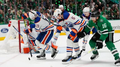 May 31, 2024; Dallas, Texas, USA; Edmonton Oilers center Adam Henrique (19) and Edmonton Oilers defenseman Cody Ceci (5) chase the puck against Dallas Stars center Joe Pavelski (16) during the second period between the Dallas Stars and the Edmonton Oilers in game five of the Western Conference Final of the 2024 Stanley Cup Playoffs at American Airlines Center. Mandatory Credit: Chris Jones-USA TODAY Sports