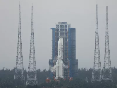 FILE PHOTO: The Chang'e 6 lunar probe and the Long March-5 Y8 carrier rocket combination sit atop the launch pad at the Wenchang Space Launch Site in Hainan province, China May 3, 2024. REUTERS/Eduardo Baptista/File Photo