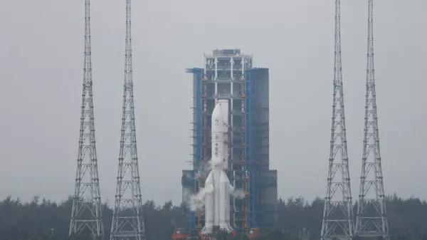 FILE PHOTO: The Chang'e 6 lunar probe and the Long March-5 Y8 carrier rocket combination sit atop the launch pad at the Wenchang Space Launch Site in Hainan province, China May 3, 2024. REUTERS/Eduardo Baptista/File Photo