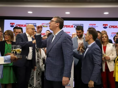 Serbian President Aleksandar Vucic drinks a toast at Serbian Progressive Party (SNS) headquarters, following exit polls results of the local election in Belgrade, Serbia, June 2, 2024. REUTERS/Zorana Jevtic